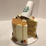 Pumpkin Spice Latte Cake - topped with a coffee drip, pumpkin candies, and a Starbucks cup!