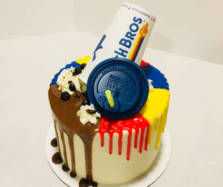 Dutch Bros Kahlua Kicker Cake - with a red, yellow, blue, and coffee drip