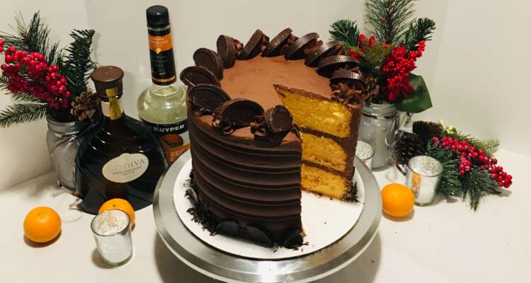 Chocolate Orange Cake (orange cake, chocolate frosting, slice cut out)