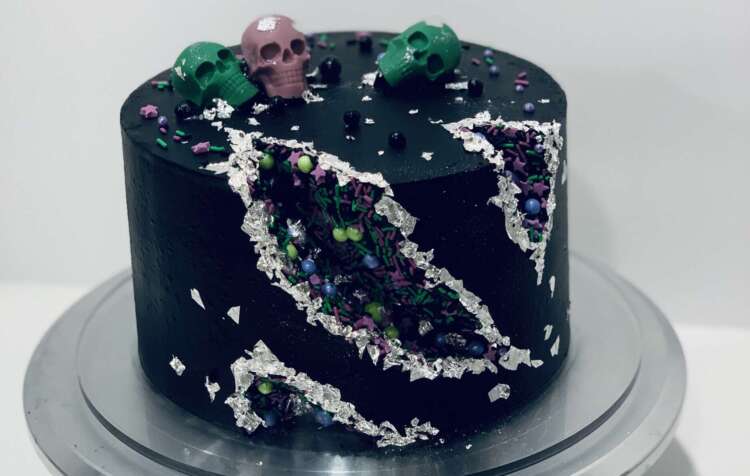 Sprinkle Geode Cake - Halloween sprinkles in a geode cutout, topped with candy melt skulls