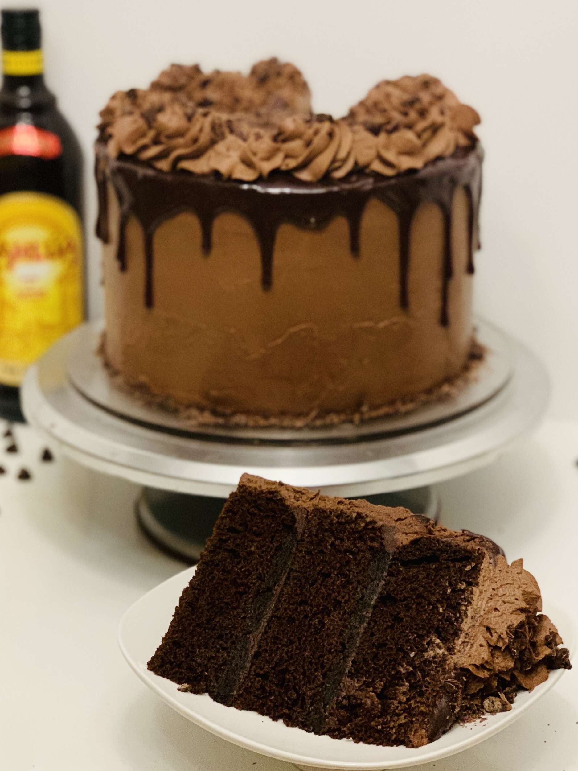 Kahlua Mudslide Cake - chocolate kahlua cake filled with kahlua ganache and covered with chocolate whipped cream
