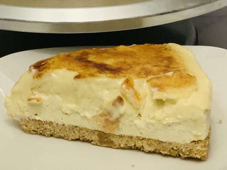 No bake creme brulee cheesecake - shows slice cut from cheesecake. Featured image at top of page.